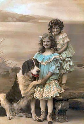 Portrait two girls with dog